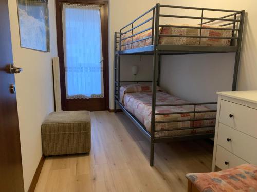 Postel nebo postele na pokoji v ubytování Residence Alpen Casavacanze