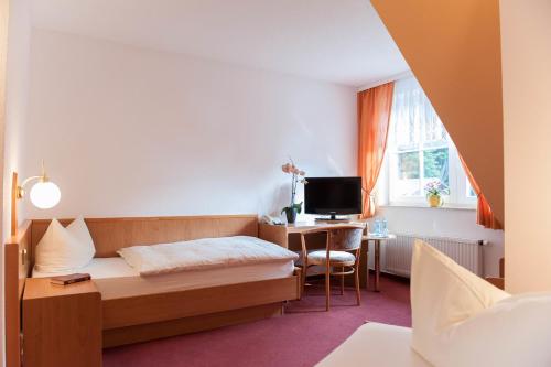 Postel nebo postele na pokoji v ubytování Hotel Gondelfahrt