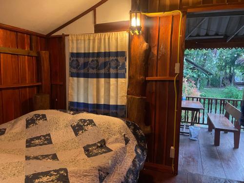 Postel nebo postele na pokoji v ubytování บ้านสวนวิวทุ่ง