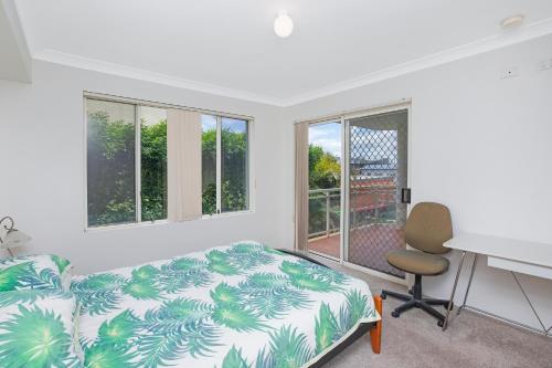 Ένα ή περισσότερα κρεβάτια σε δωμάτιο στο Westport Palms 2