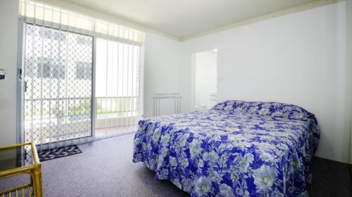 Postel nebo postele na pokoji v ubytování Paradise Court 1