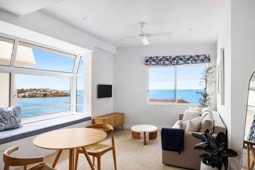 a living room with a view of the ocean at Studio Bondi Beach in Sydney