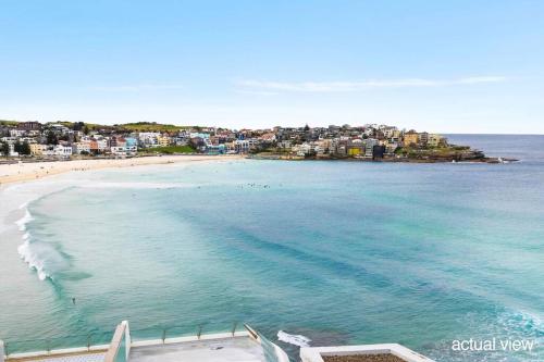 an aerial view of a beach and a city at Studio Bondi Beach in Sydney