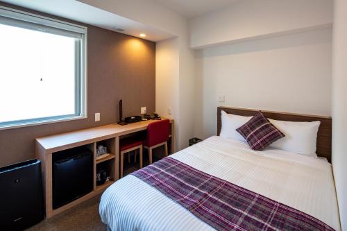 Katil atau katil-katil dalam bilik di Hotel Reference Reisen