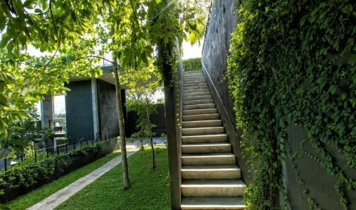 a set of stairs next to a building at Splendour Residence in Balapitiya