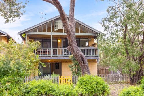 an exterior view of a house with trees at Pet Friendly Family Favourite - Kangaroo and Fairway Views with Air Con in Dunsborough