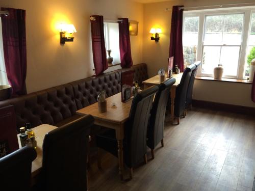 Χώρος καθιστικού στο Hunters Lodge Inn