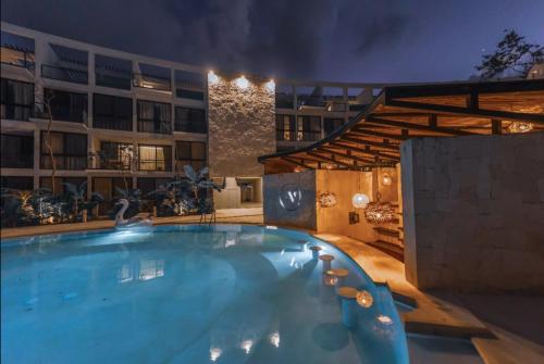 Der Swimmingpool an oder in der Nähe von The Waves Tulum by BNB Experience
