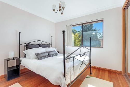 Una cama o camas en una habitación de Argia Jervis Bay