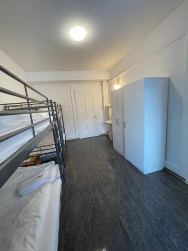 Postel nebo postele na pokoji v ubytování Zentrum Haus Davos