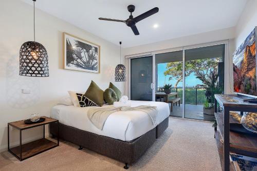 Katil atau katil-katil dalam bilik di Living the Beach