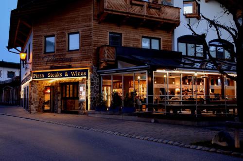 a store front of a building on a street at Appartement Feinsinn in Westendorf