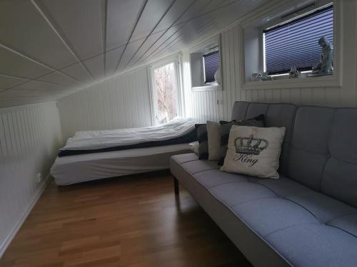 Tempat tidur dalam kamar di Lyngen Panorama, Solberget