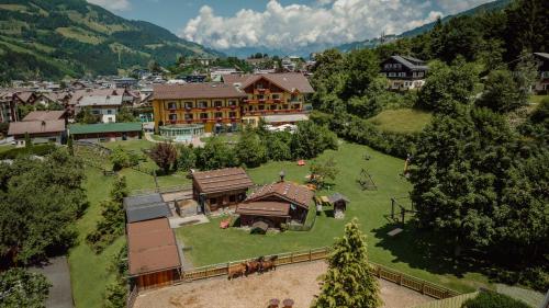 an aerial view of a town with a large building at Hotel Lerch in Sankt Johann im Pongau