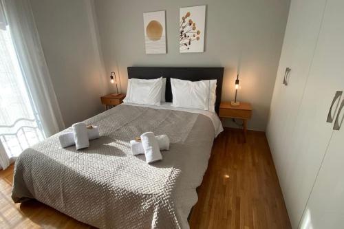 Posteľ alebo postele v izbe v ubytovaní GPK Lux 2BR - 7 min walking to Acropolis