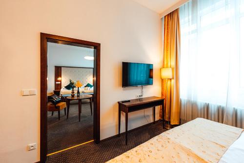TV a/nebo společenská místnost v ubytování Hotel Baltaci Atrium