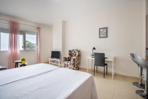 Ένα ή περισσότερα κρεβάτια σε δωμάτιο στο Home2Book Peaceful Getaway in Bajamar