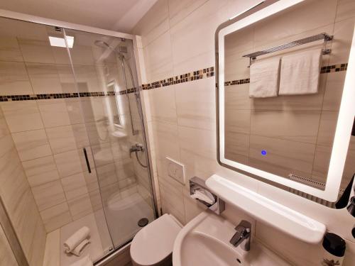 Koupelna v ubytování Sophien Hotel