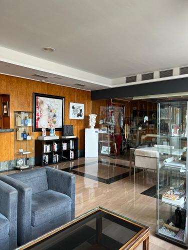 a living room with a couch and a table at Estela Barcelona in Sitges