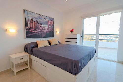 Posteľ alebo postele v izbe v ubytovaní APARTAMENTO SCORPIO 514 by Homestaygrancanaria