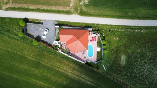 an overhead view of a house in a field at SECRET WELLNESS in Bodonci
