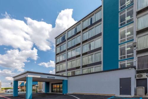 an office building with a blue building at Baymont by Wyndham Laredo in Laredo