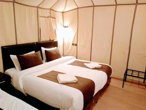 Ένα ή περισσότερα κρεβάτια σε δωμάτιο στο Magic Luxury Camp