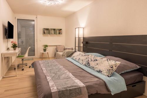 Μια τηλεόραση ή/και κέντρο ψυχαγωγίας στο Ferienwohnung Im Haidelmoos