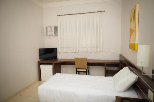 TV a/nebo společenská místnost v ubytování Real Palace Hotel