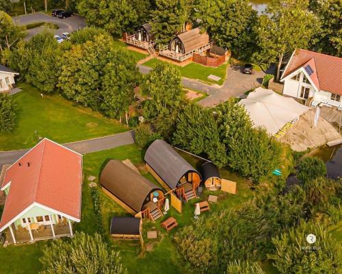 an overhead view of a model house with a yard at Pod aan het water in Dokkum