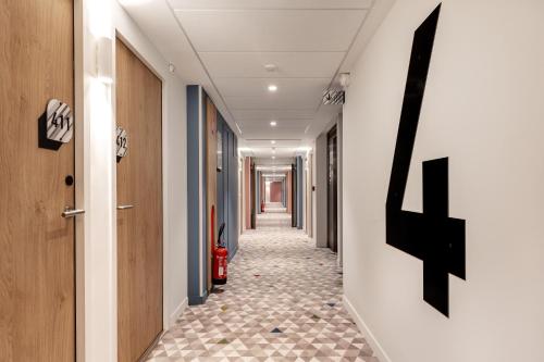 Μια τηλεόραση ή/και κέντρο ψυχαγωγίας στο B&B HOTEL Lille Lillenium Eurasanté