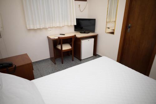 TV a/nebo společenská místnost v ubytování Real Palace Hotel