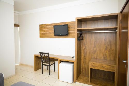 TV a/nebo společenská místnost v ubytování Real Palace Hotel