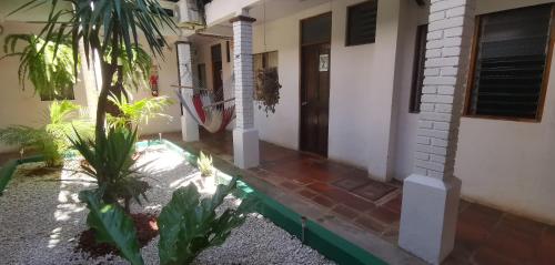 a view of the front door of a house at Hotel Aldea Pura Vida in Puntarenas