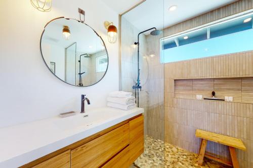 a bathroom with a sink and a mirror at Wowanka Paradise in Yucca Valley