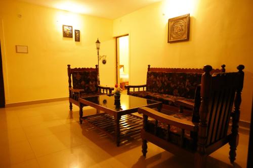 Posezení v ubytování kollanoor guest house