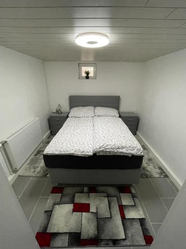 Ένα ή περισσότερα κρεβάτια σε δωμάτιο στο Dambach Appartement