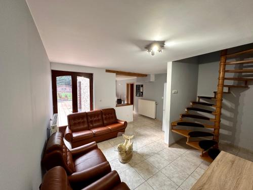 Χώρος καθιστικού στο Chambre et SDD privées dans une maison partagée avec des résidents