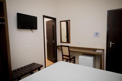 TV a/nebo společenská místnost v ubytování Hotel Real Garden