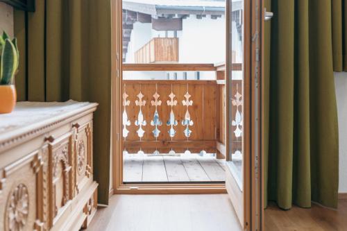 Ένα ή περισσότερα κρεβάτια σε δωμάτιο στο Appartements Höllhaus