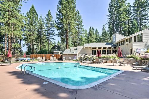 a swimming pool in front of a house at 2 Mi to Beaches and Trails Tahoe Area Home with Sauna in Stateline