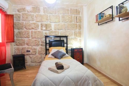 Postel nebo postele na pokoji v ubytování Casa Marrón Boutique Home