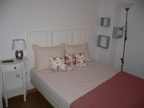 Postel nebo postele na pokoji v ubytování Maria João