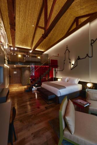 Ein Sitzbereich in der Unterkunft Casa Firenza Hotel & Suites Boutique