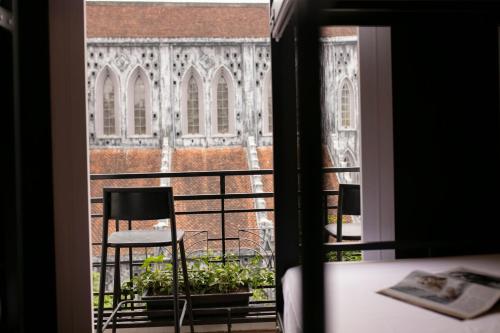 a view from a window of a building at Drift Backpackers Hostel in Hanoi