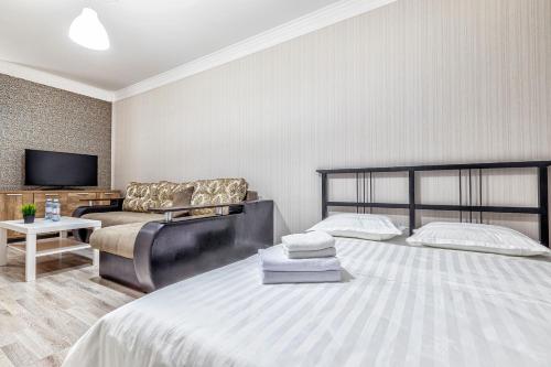 Кровать или кровати в номере Raisson Ahotel C14
