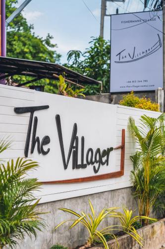 a sign for the vleecer on a building at The Villager Fishermans Village in Bophut