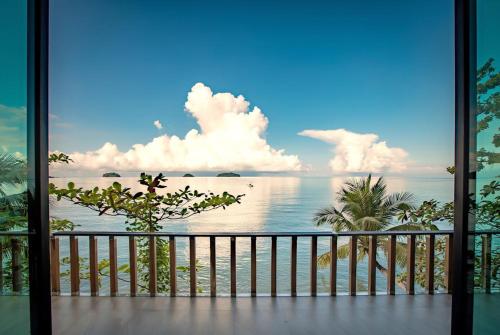 a view of the ocean from a balcony at KaiBaeBeach GrandView in Trat