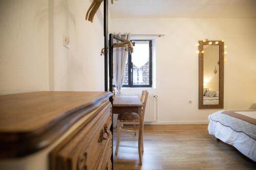 Cama o camas de una habitación en Le Vieux Pressoir