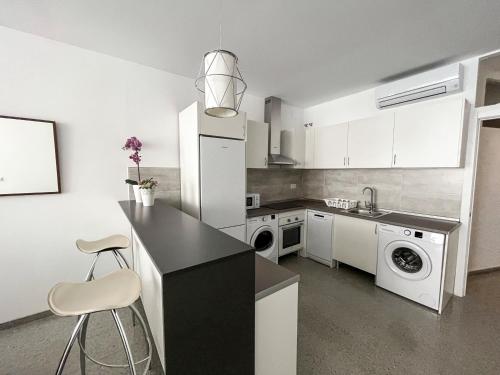Kuchyňa alebo kuchynka v ubytovaní Amplio apartamento en Av. Carlos Haya